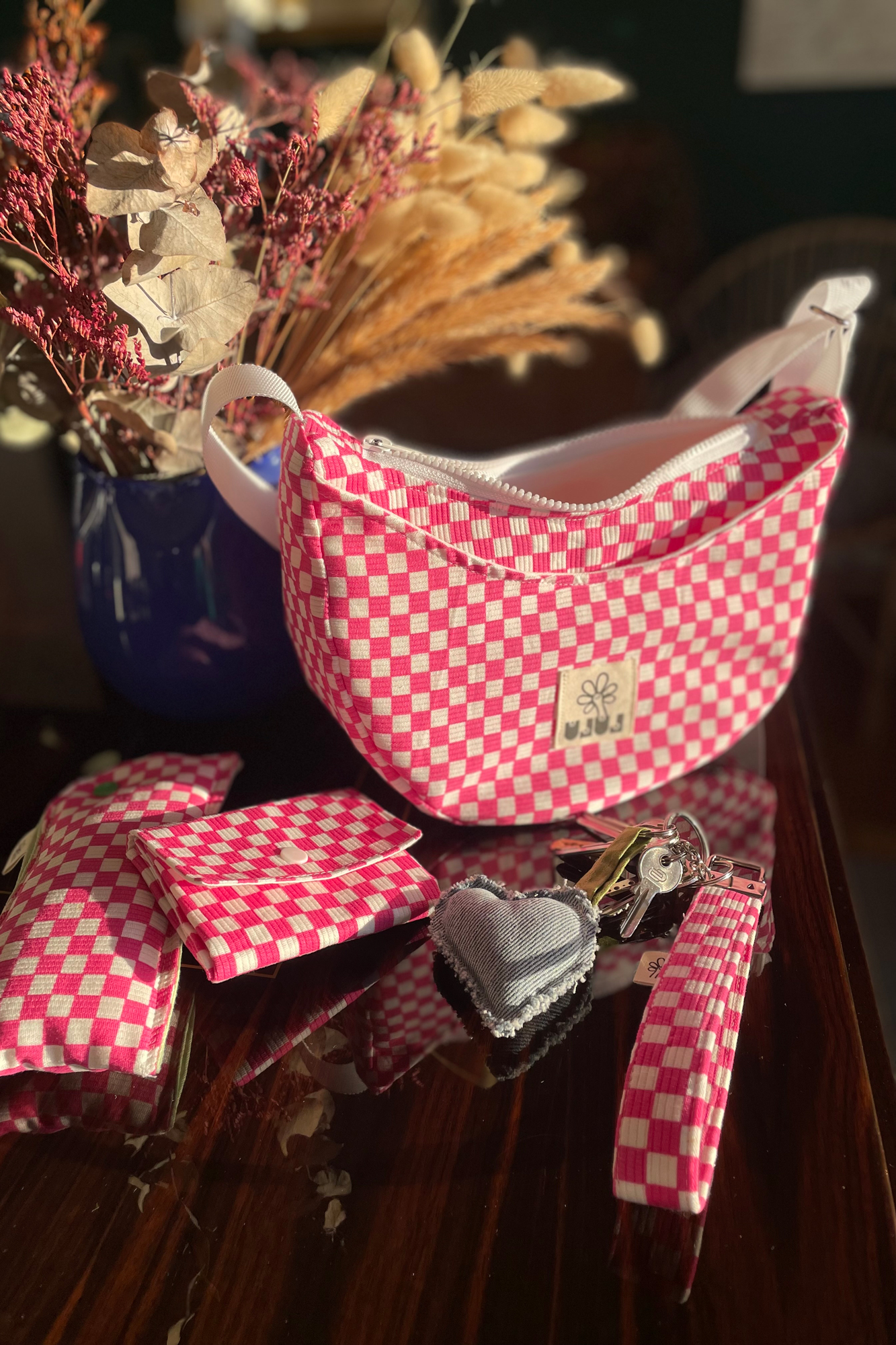 Sac croissant damier rose